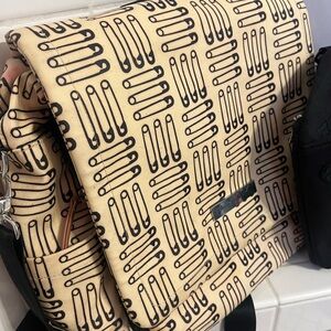 Petunia Pickle Bottom Cream and Black Baby Bag